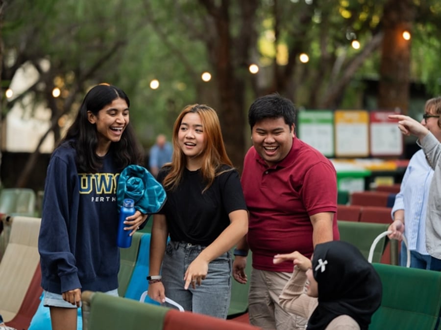 A student discussing study options with an adviser