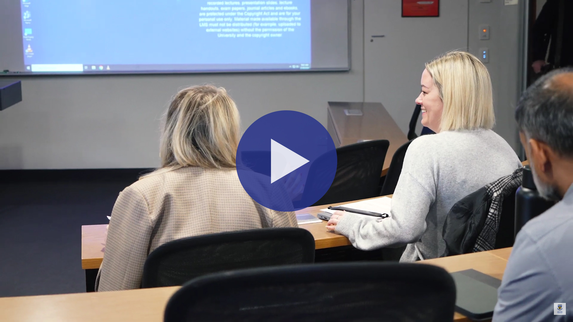 Two LIT MBA students discussing their coursework